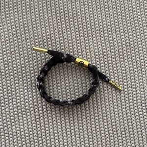 Elegant Black and Gold Braided Bracelet